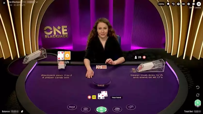 live dealer in one blackjack wearing black dress