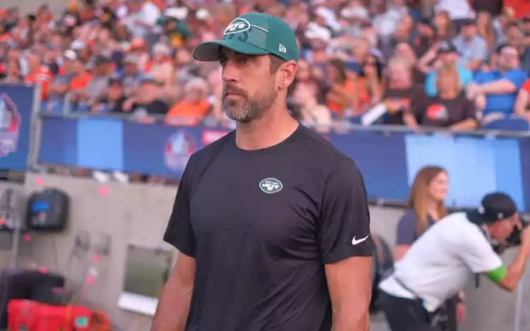 Aaron Rodgers with a New York Jets cap