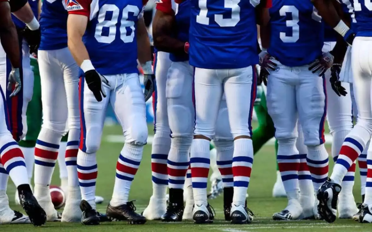 Canada Football players standing around