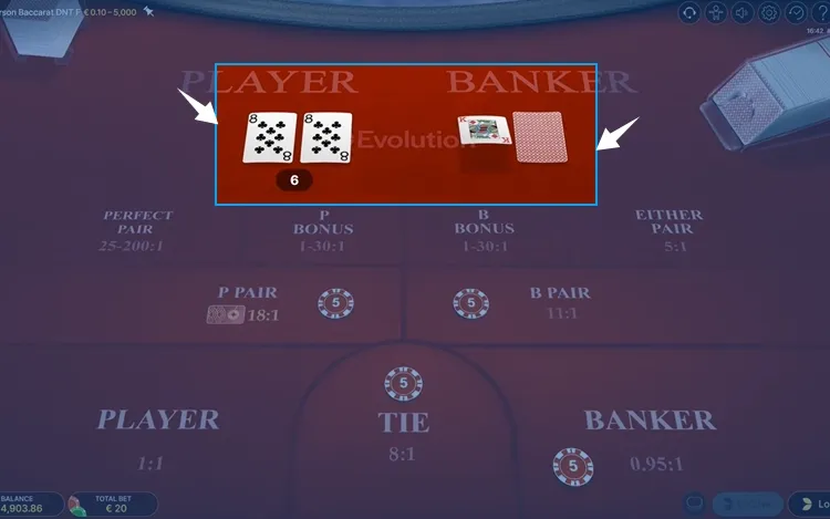 dealing cards at a baccarat table