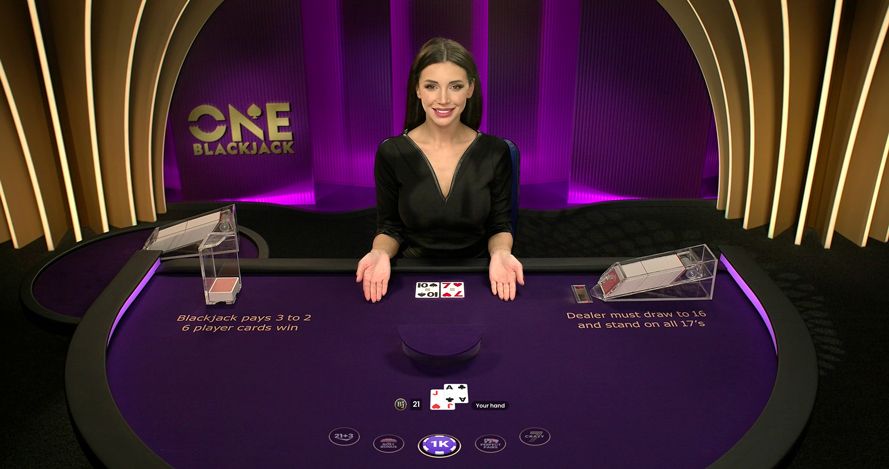 a female live dealer in one blackjack live game